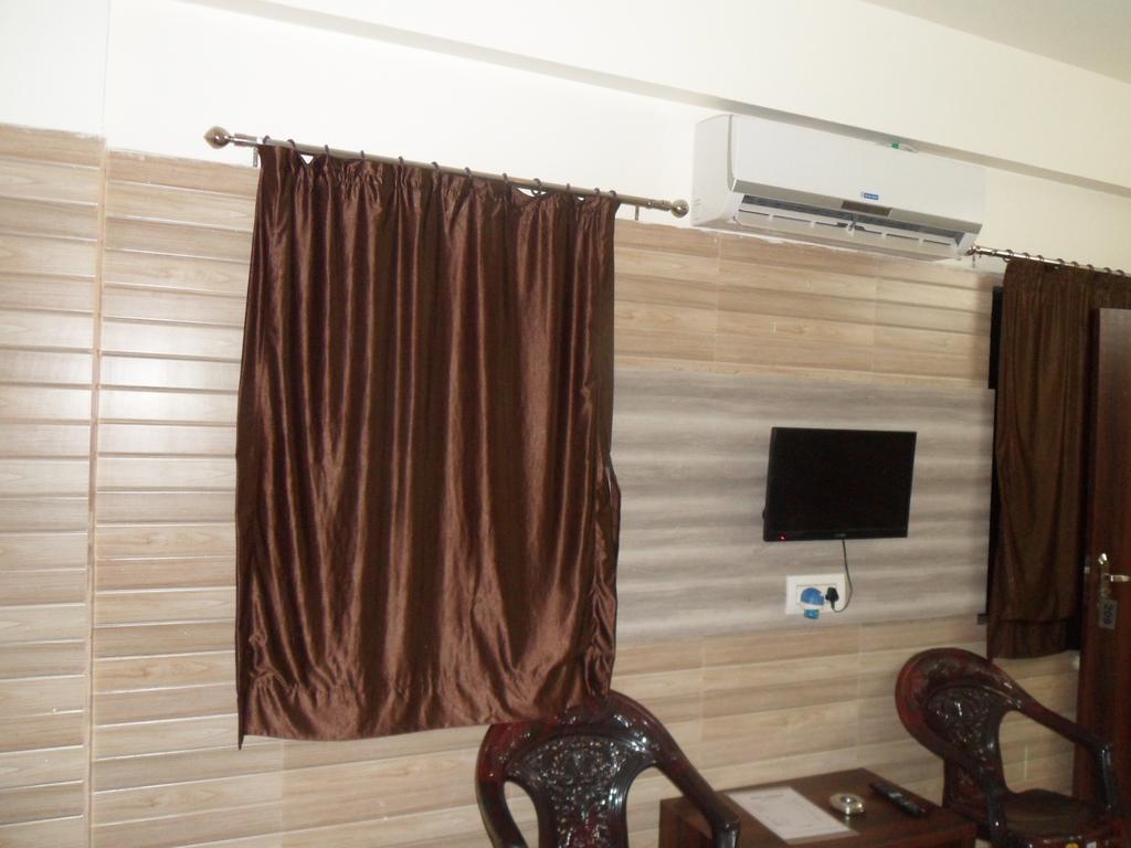 Hotel Madhusudan Dwārka Kamer foto